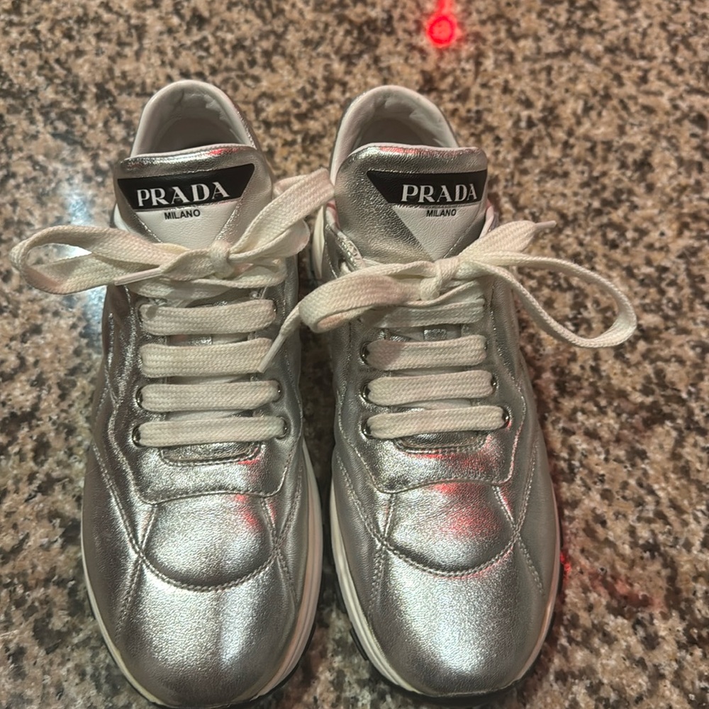 Prada silver tennis shoess